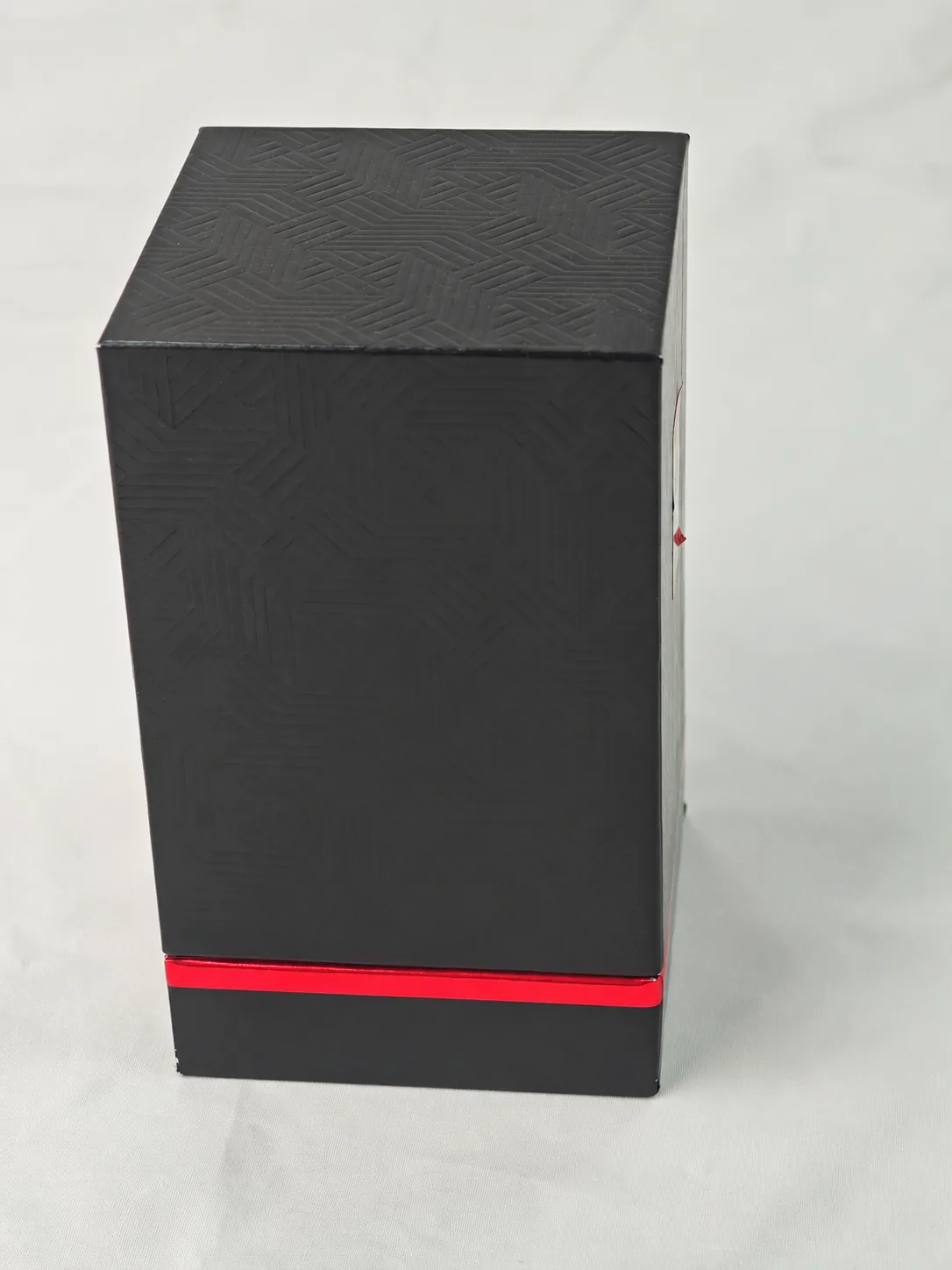 Matching black and red perfume outer box