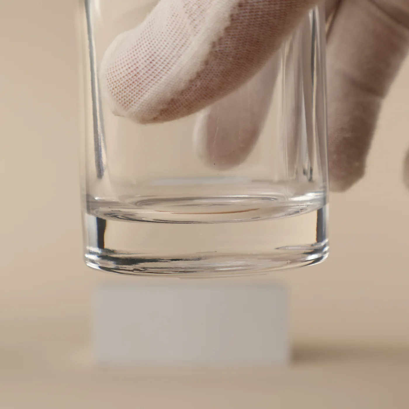 Close view of the glass bottle base