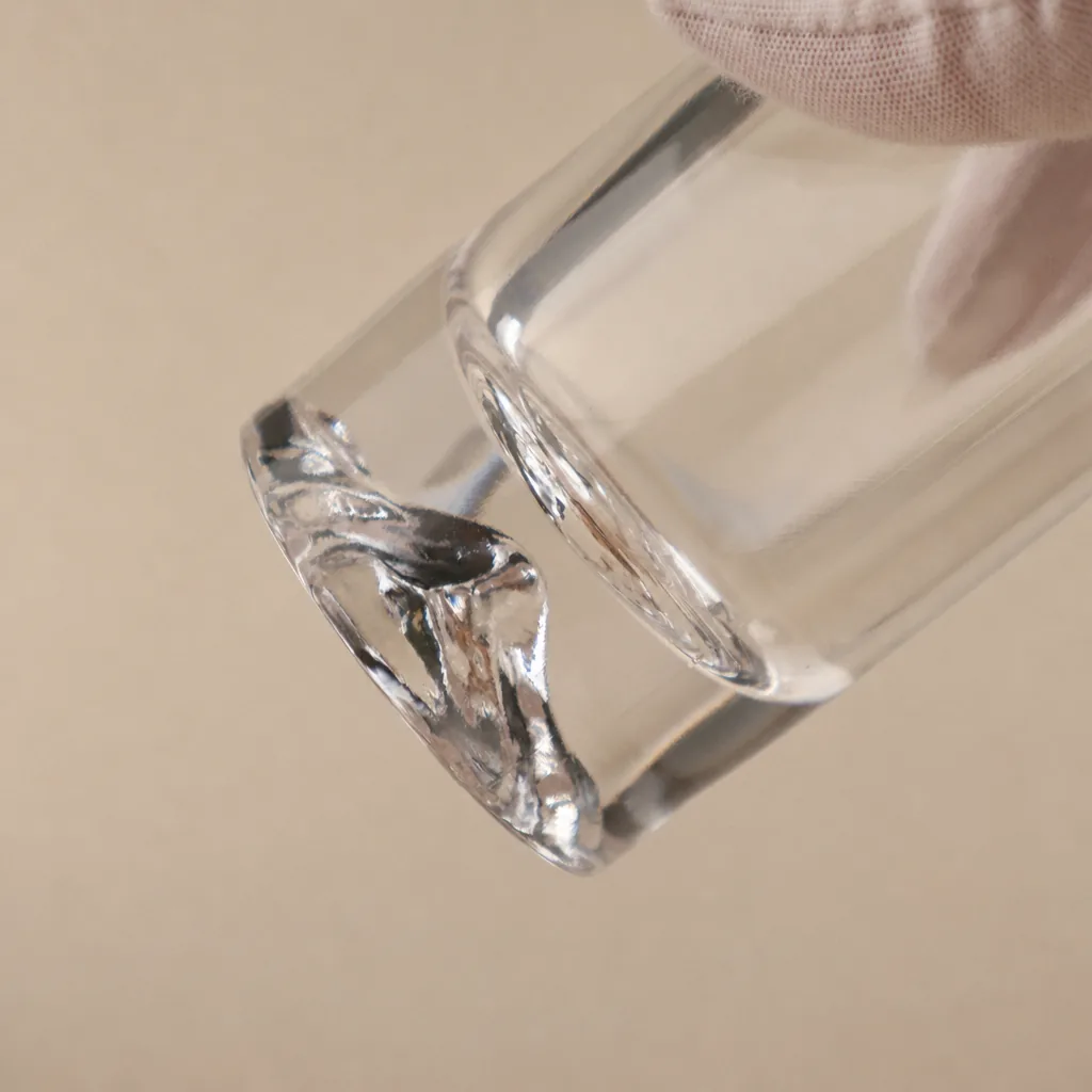 Close view of the glass bottle base